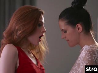 Watch this sedusive redhead take her lesbian lover's faux phallus