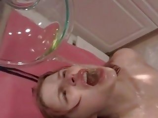 Mademoiselle drinks piss in fetish play