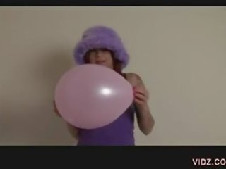 Flirty slut rubs Pussy against balloon