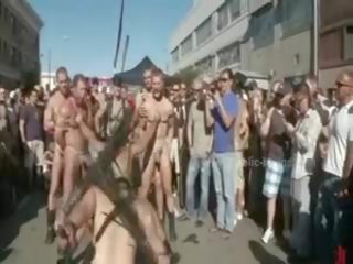 Public Plaza With Stripped Men Prepared For Wild Coarse Violent Gay Group adult clip